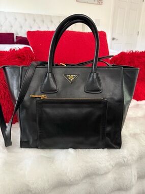 Prada soft Black Leather Top handle bag with Gold Triangle Logo